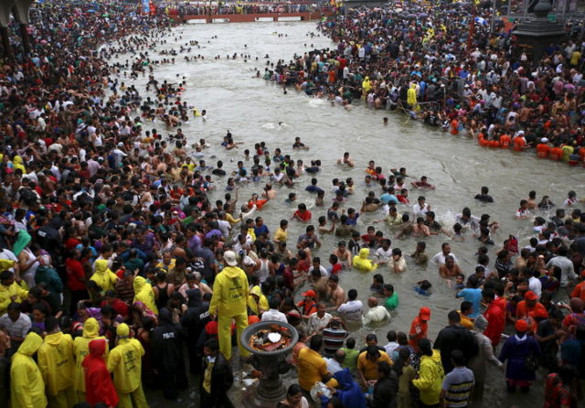 Devotees attend the third
